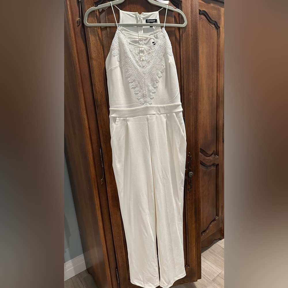 Express v neck lace white tie up Jumpsuit NWT! Size Small TTS